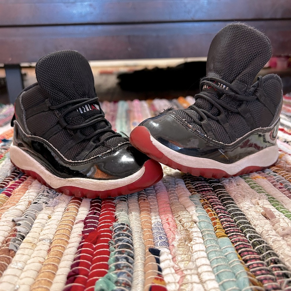Kids Jordan’s 11 Retro playoff breds